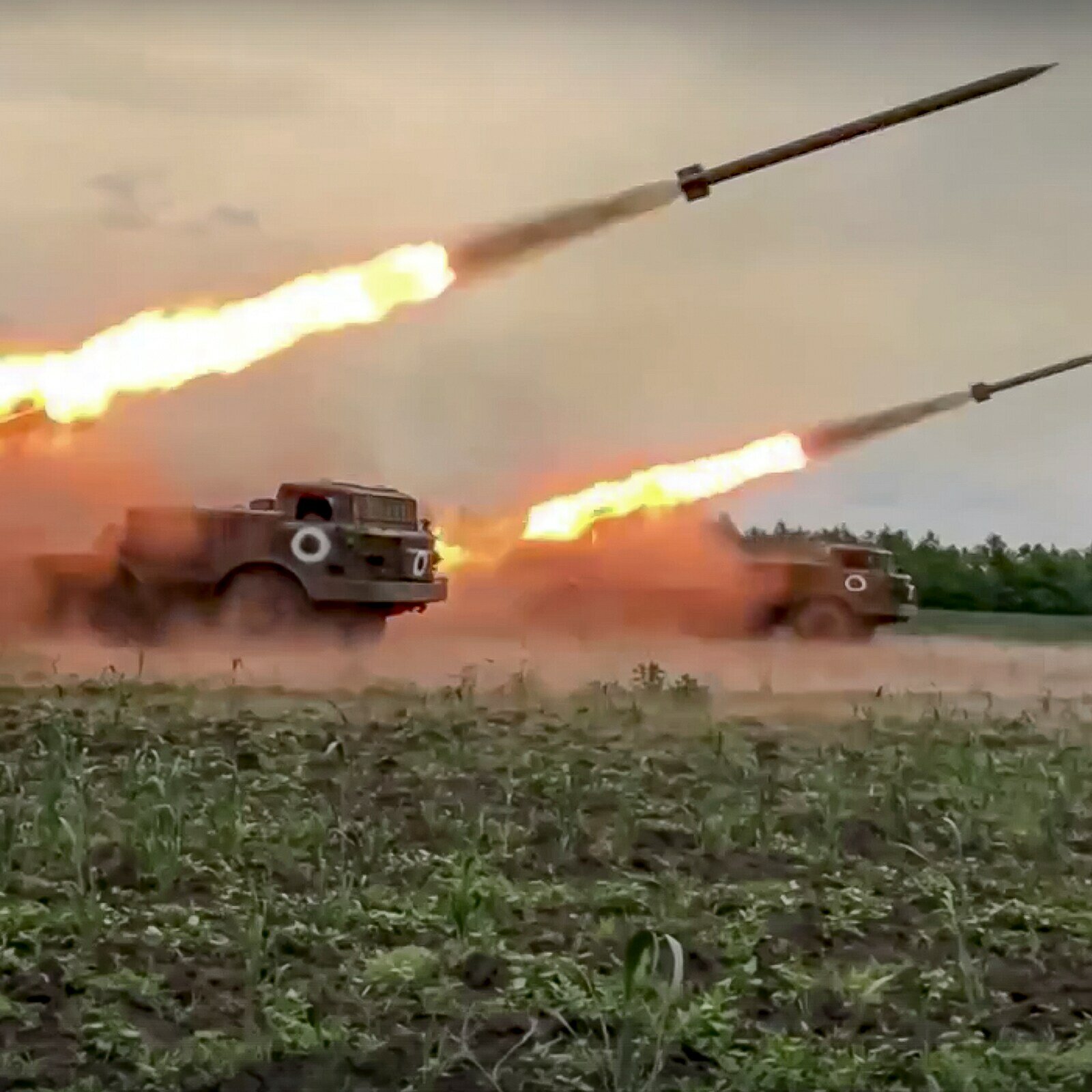 The Russian military's Uragan multiple rocket launchers fire rockets at Ukrainian troops at an undisclosed location. (Image And Caption: Russian Defense Ministry Press Service via AP)